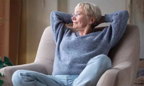 Older woman relaxing on a chair