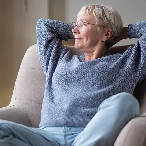 Older woman relaxing on a chair