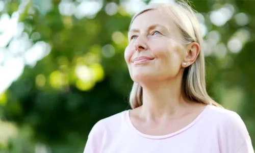 older adult woman enjoying time outdoors